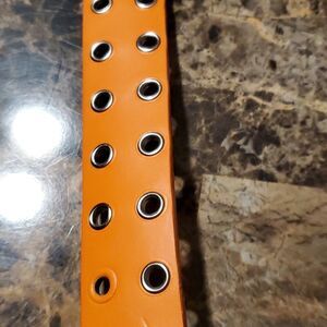 1.5 inch wide orange riveted belt